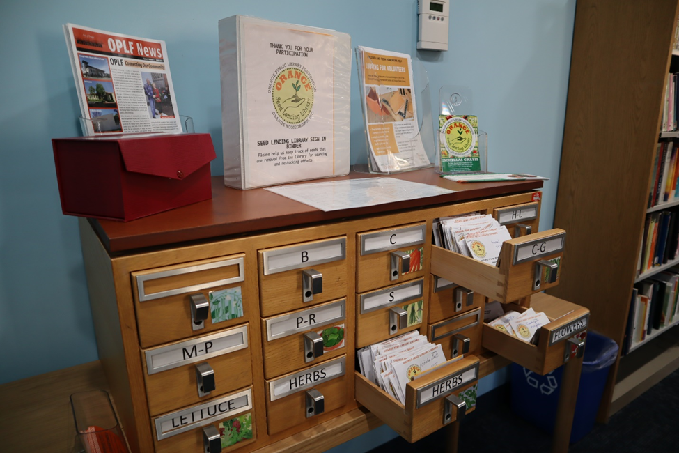 Orange Seed Lending Libraries Help Grow Gardens Across the Community
