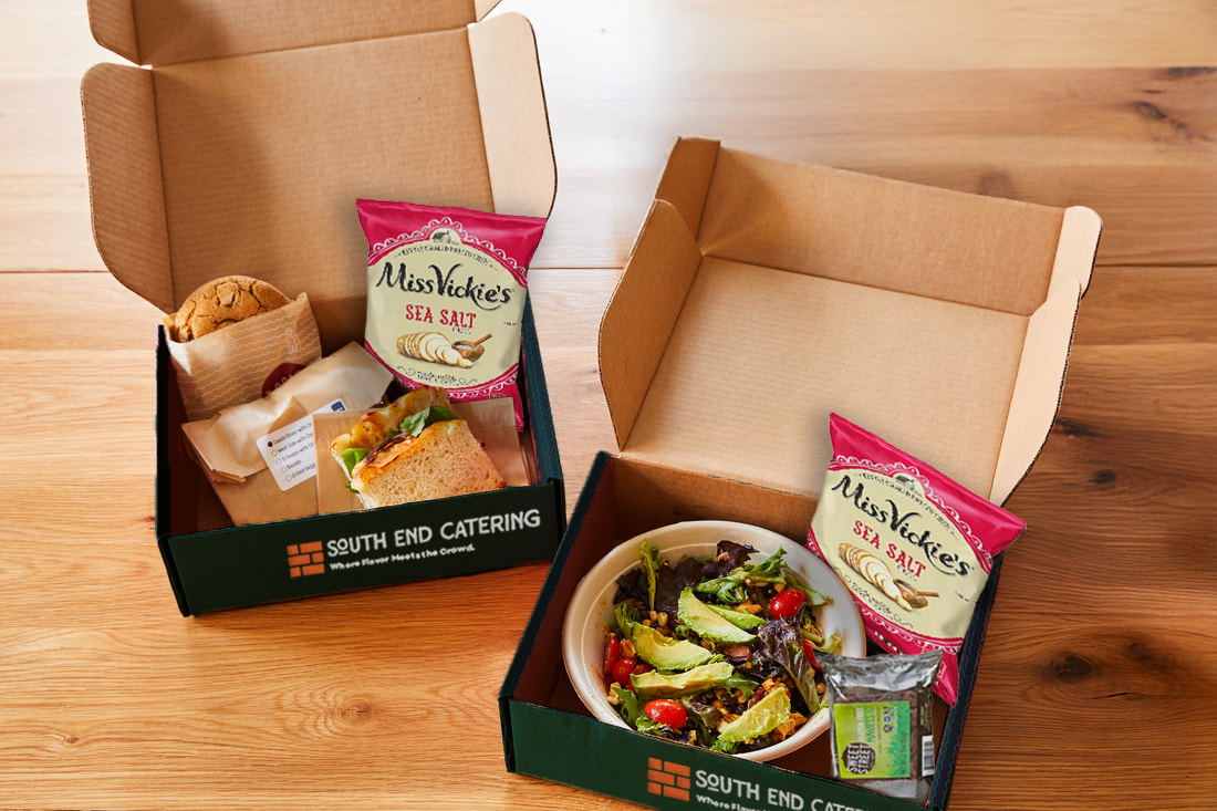 Boxed lunch with salad and chips