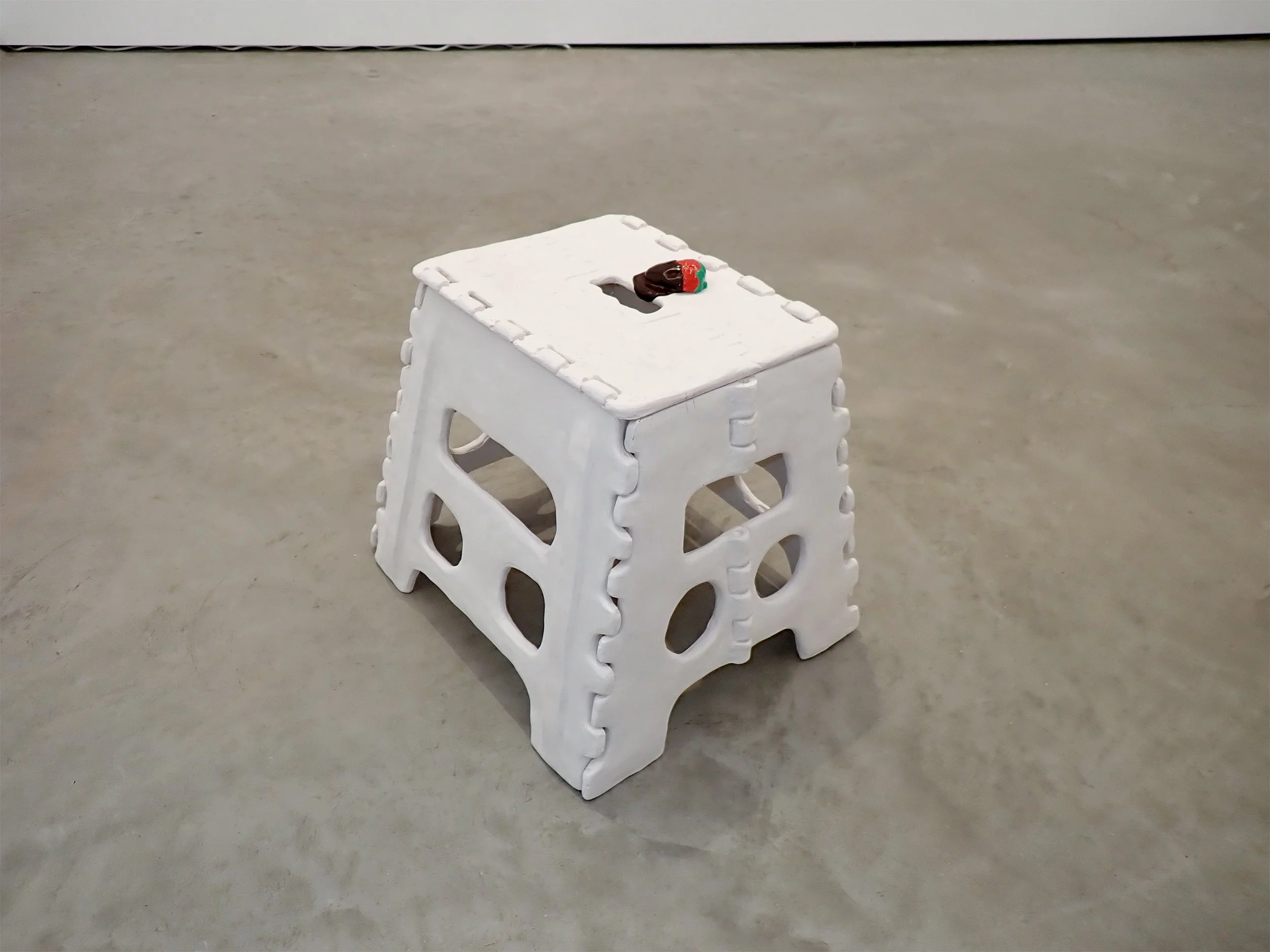 Stool with Chocolate Covered Strawberry (Lora + Colin), 2025. Pigmented cement, polychromed aluminum, epoxy putty