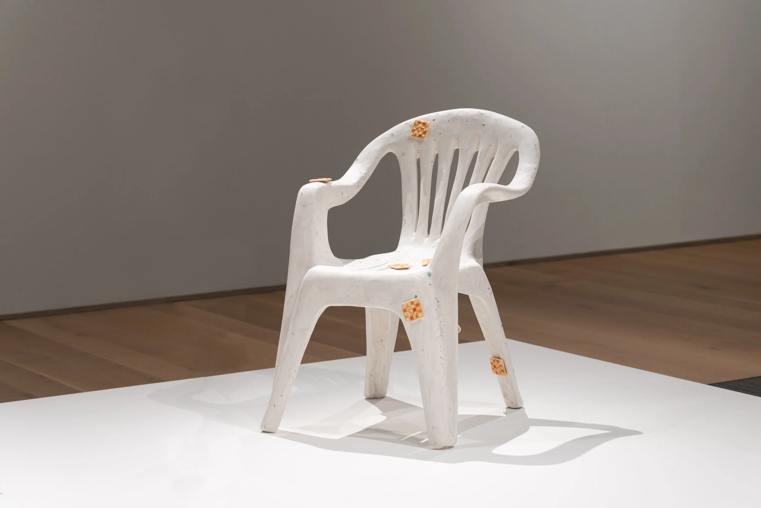 Chair with Crackers, 2024, Saint Louis Art Museum. Hydrocal, recycled glass, pigment, aluminum, pewter, copper, oil-based paint