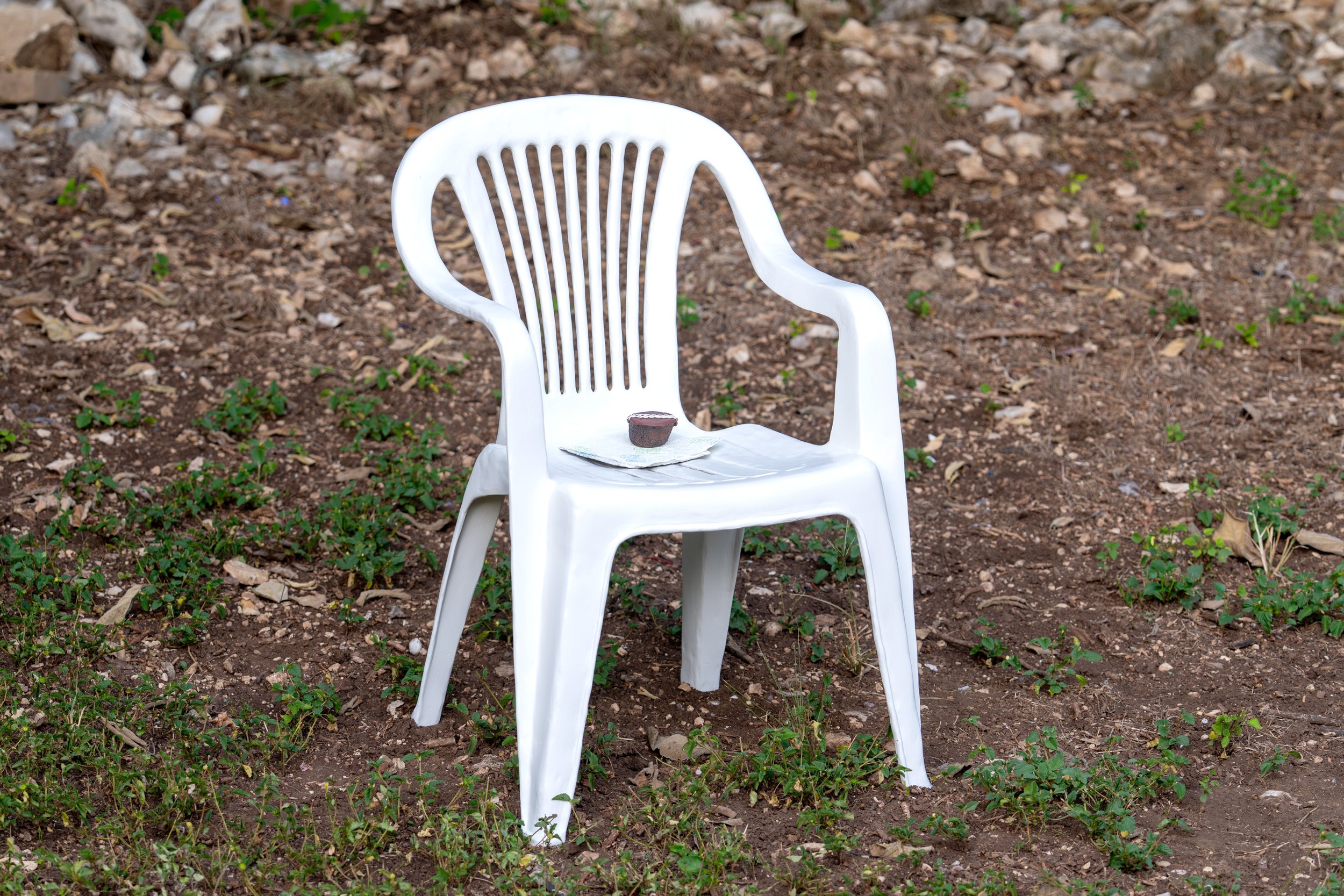 Chair with Napkin and Cake, 2025. Bronze, latex and oil-based paint