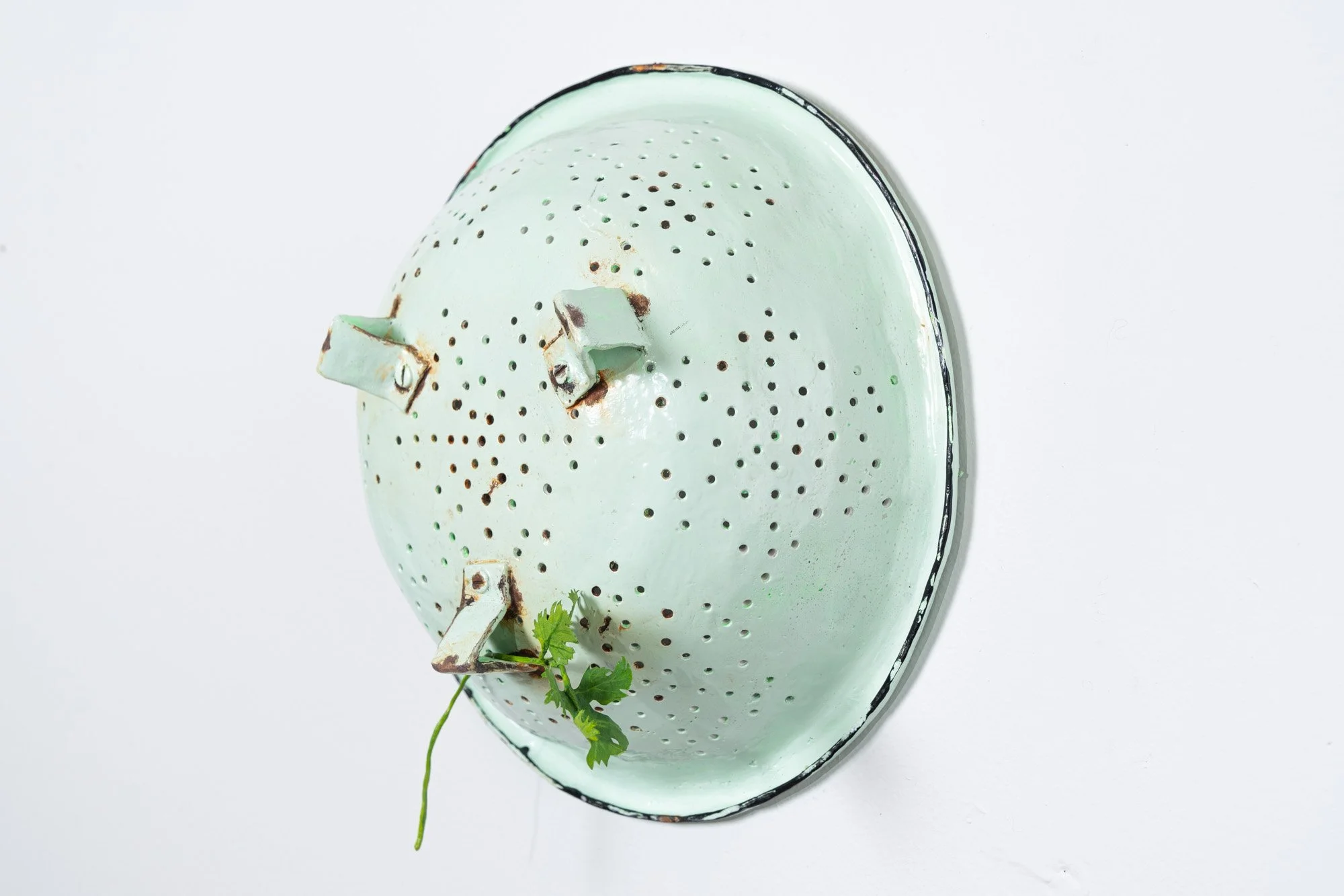 Colander with Cilantro, 2021. Hydrocal, fiberglass, wire, epoxy putty, Tyvek, enamel, acrylic paint