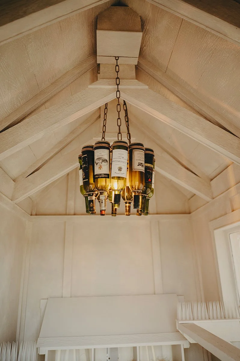 chateau-de-luvi-wine-bottle-chandelier-closeup.jpg