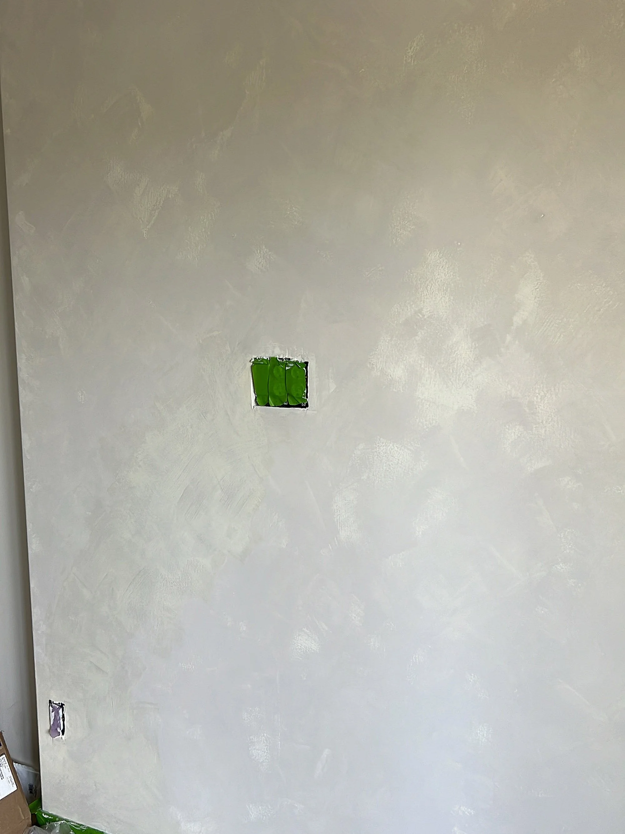 "Layered limewash accent wall finish in bedroom with Bone and Wabi Colour Atelier paints. The interplay of light and dark creates a wall that feels alive, organic, and uniquely crafted.