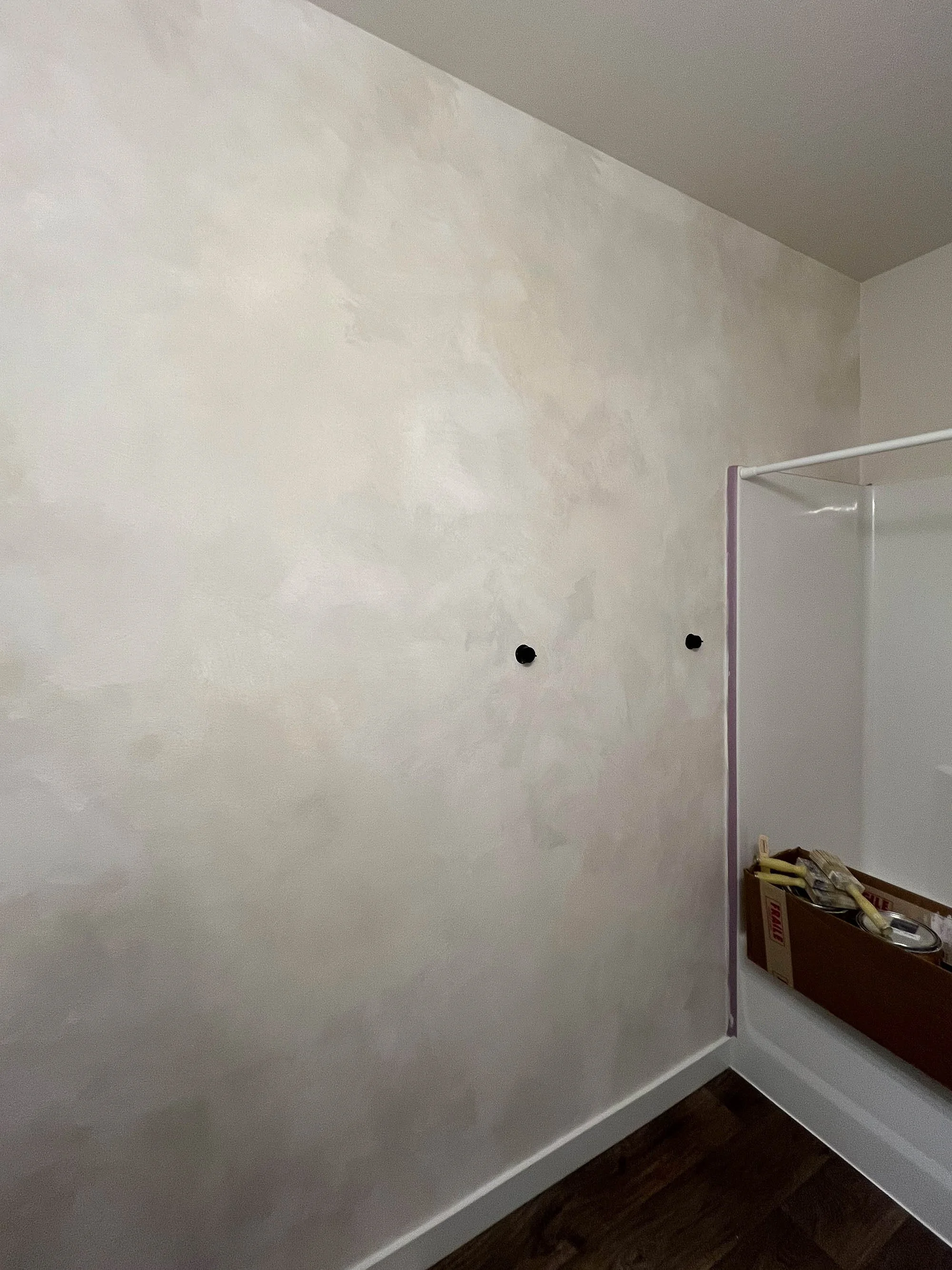 Organic movement and tone variation in this limewashed bedroom add warmth, tranquility, and sophistication.