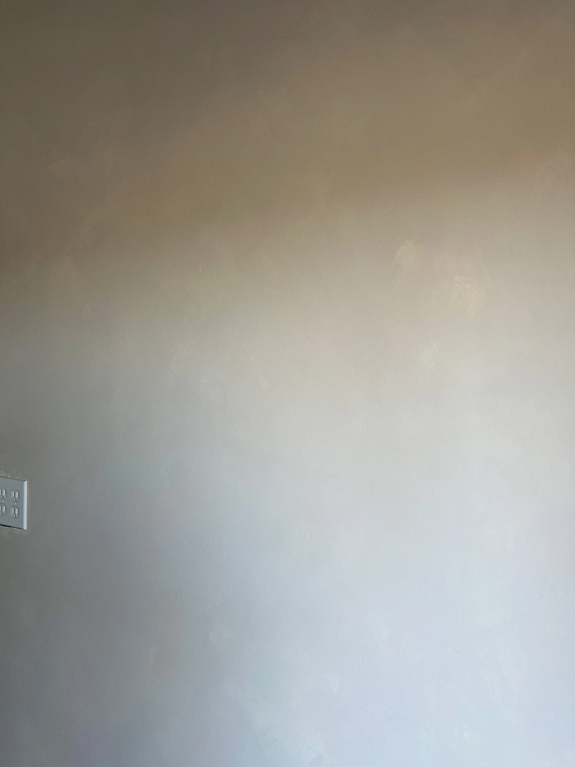 "Layered limewash accent wall finish in a bedroom using Bone and Wabi Colour Atelier lime paints. The interplay of light and dark creates a surface that feels alive and organic, while the balanced tones bring a sense of calm, warmth, and timeless har