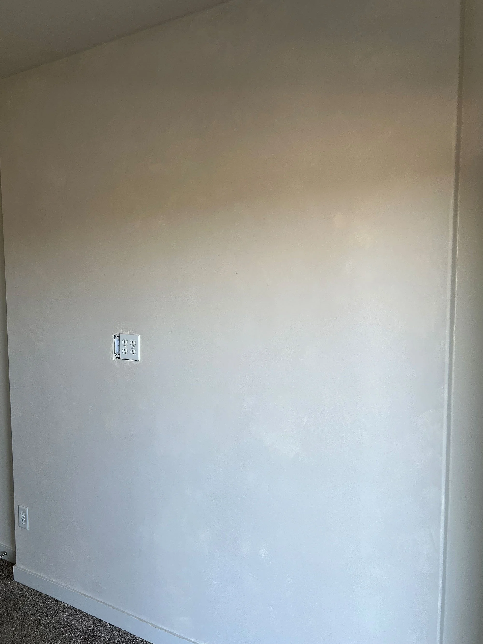 A serene bedroom limewash wall in Tri-Cities WA — layered Bone and Wabi tones by artisan Ob Cruz.