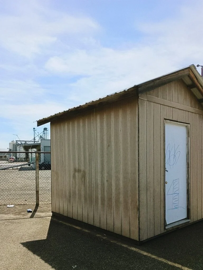 Side view of original 8x10 garden shed exterior before renovation in Prosser, Washington.