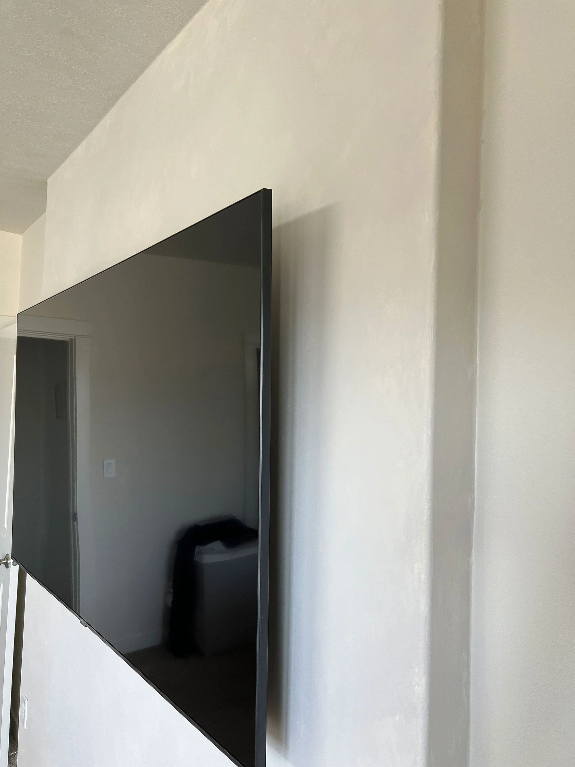 "Layered limewash accent wall finish in a bedroom using Bone and Wabi Colour Atelier lime paints. The interplay of light and dark creates a surface that feels alive and organic, while the balanced tones bring a sense of calm, warmth, and timeless har