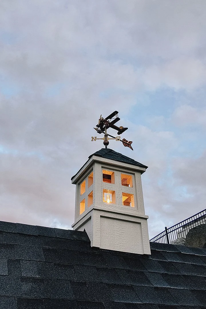 chateau-de-luvi-cupola-lantern-and-biplane-weathervane-detail.jpg