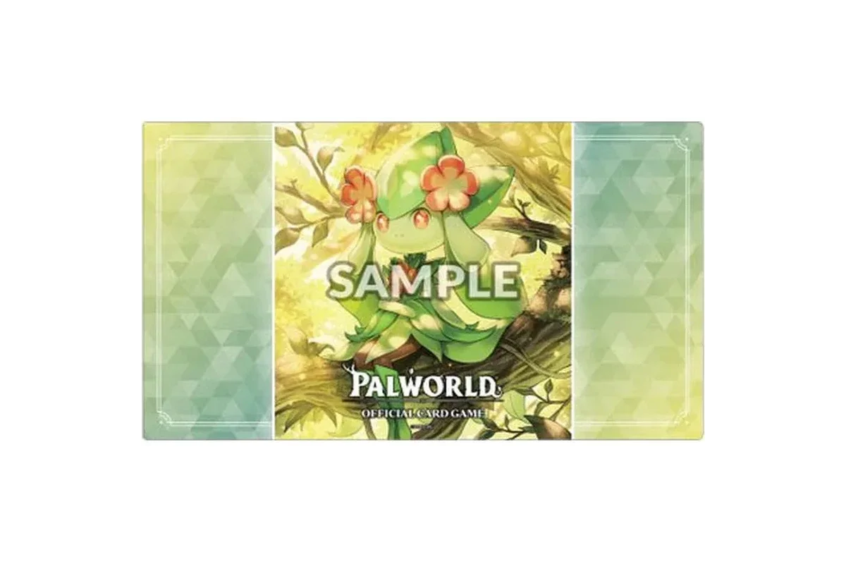 Palworld Official Card Game playmat showing Petallia, a green plant-like Pal with large red flowers, resting among branches in a sunlit forest.