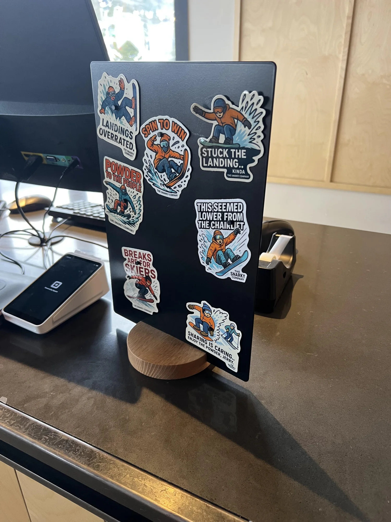 The Snarky Company sticker display at a retailer