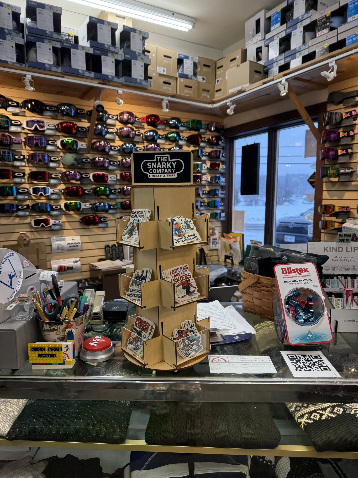 Snarky sticker display in a ski shop