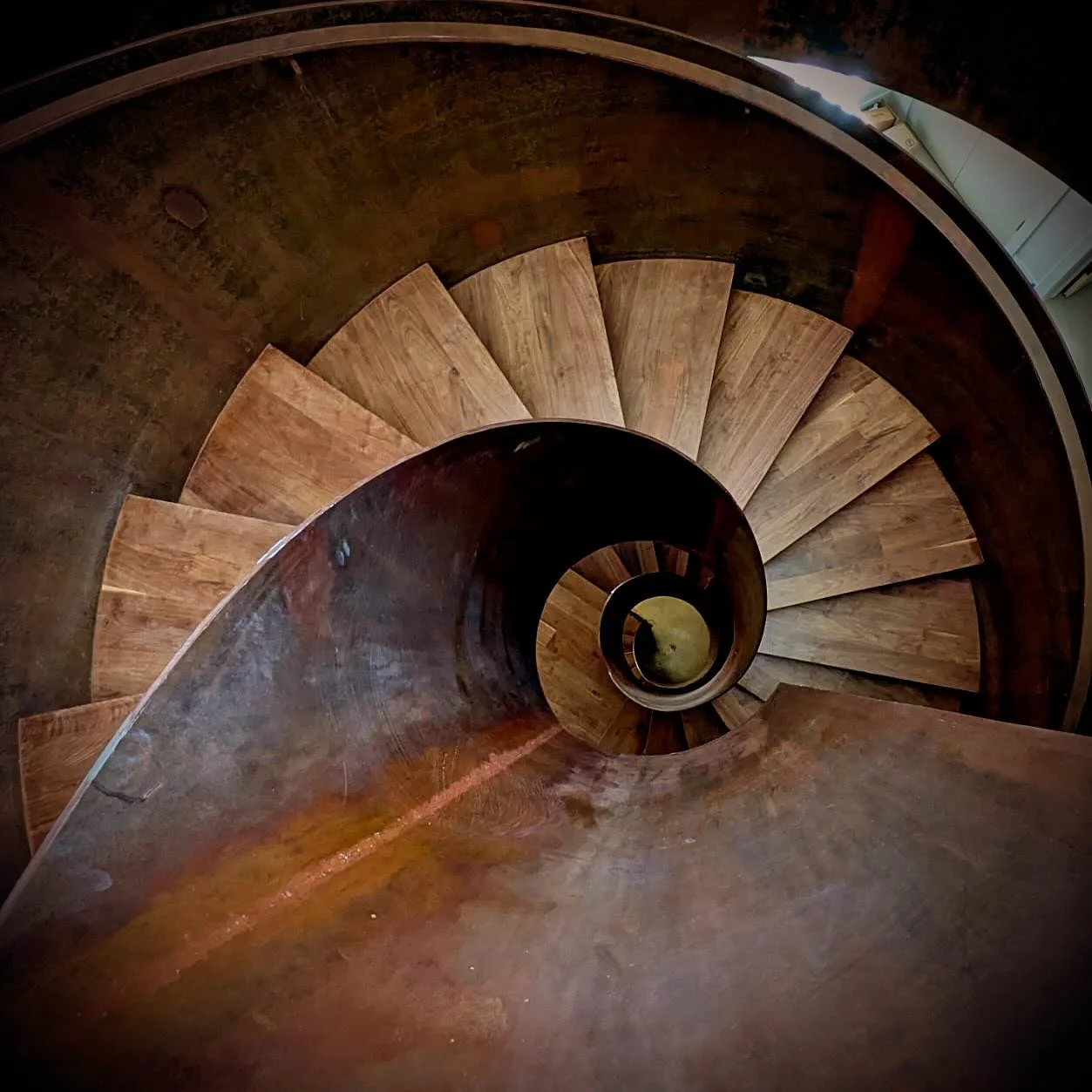 Precision meets craft. Custom spiral stair with a hand-applied patina. From LiDAR scan to Fabrication Documentation, every detail provided by our team. Fabricated by @innovativeironutah #CustomStairs #ArchitecturalDesign #Fabrication