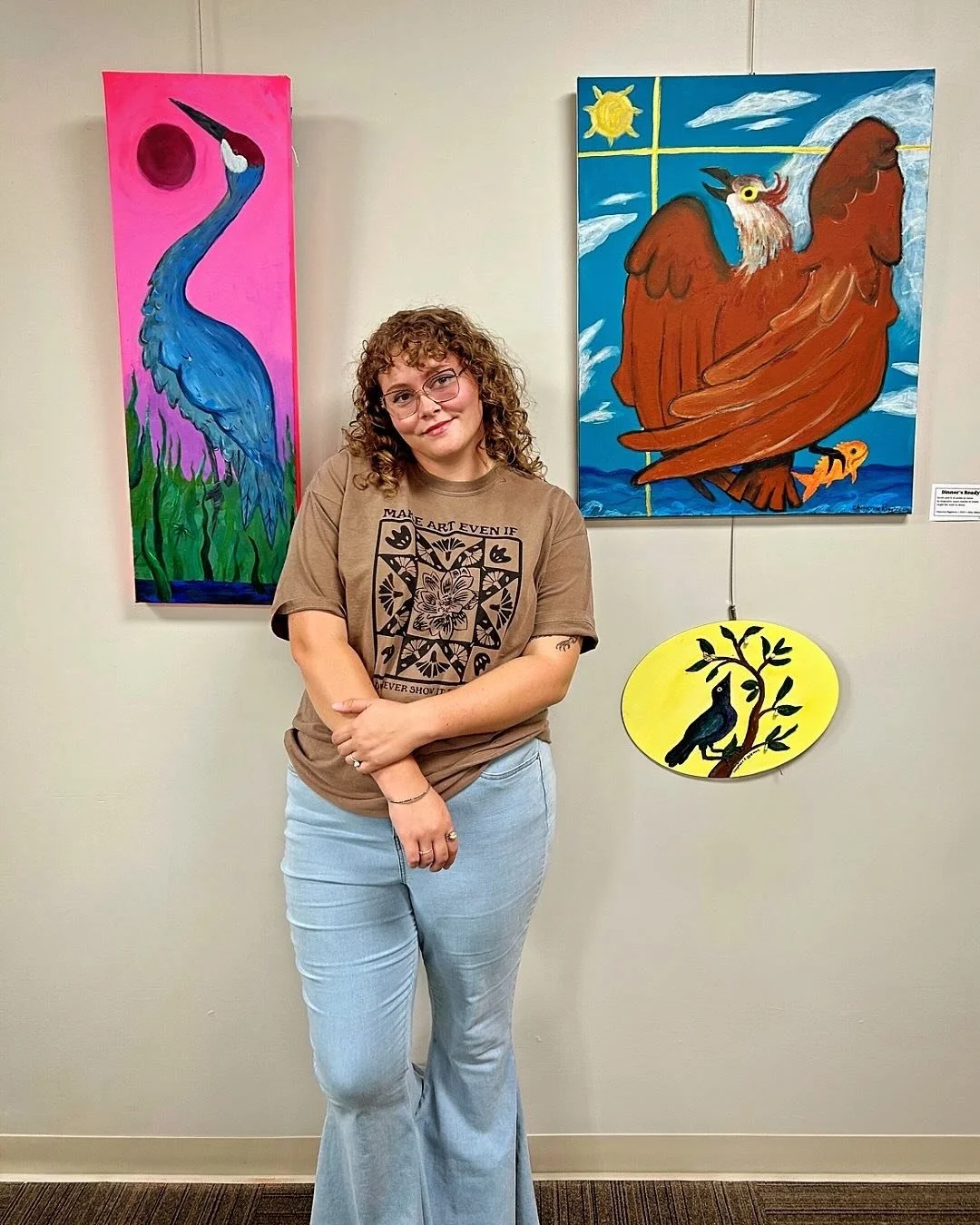 Artist Cheyenne Riggleman with pieces from her Prairie Watchers show.