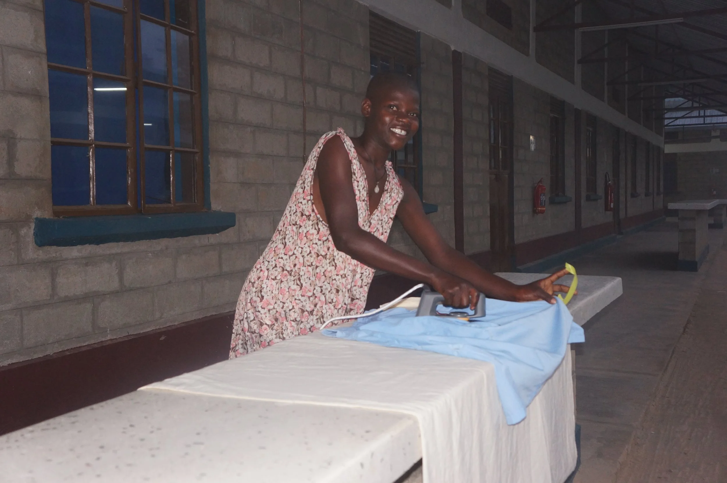 Ironing cloths at boarding school (2).JPG