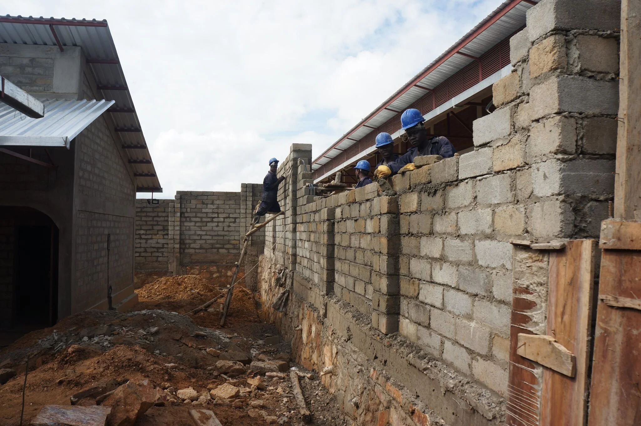 The security wall being erected around the facility. 