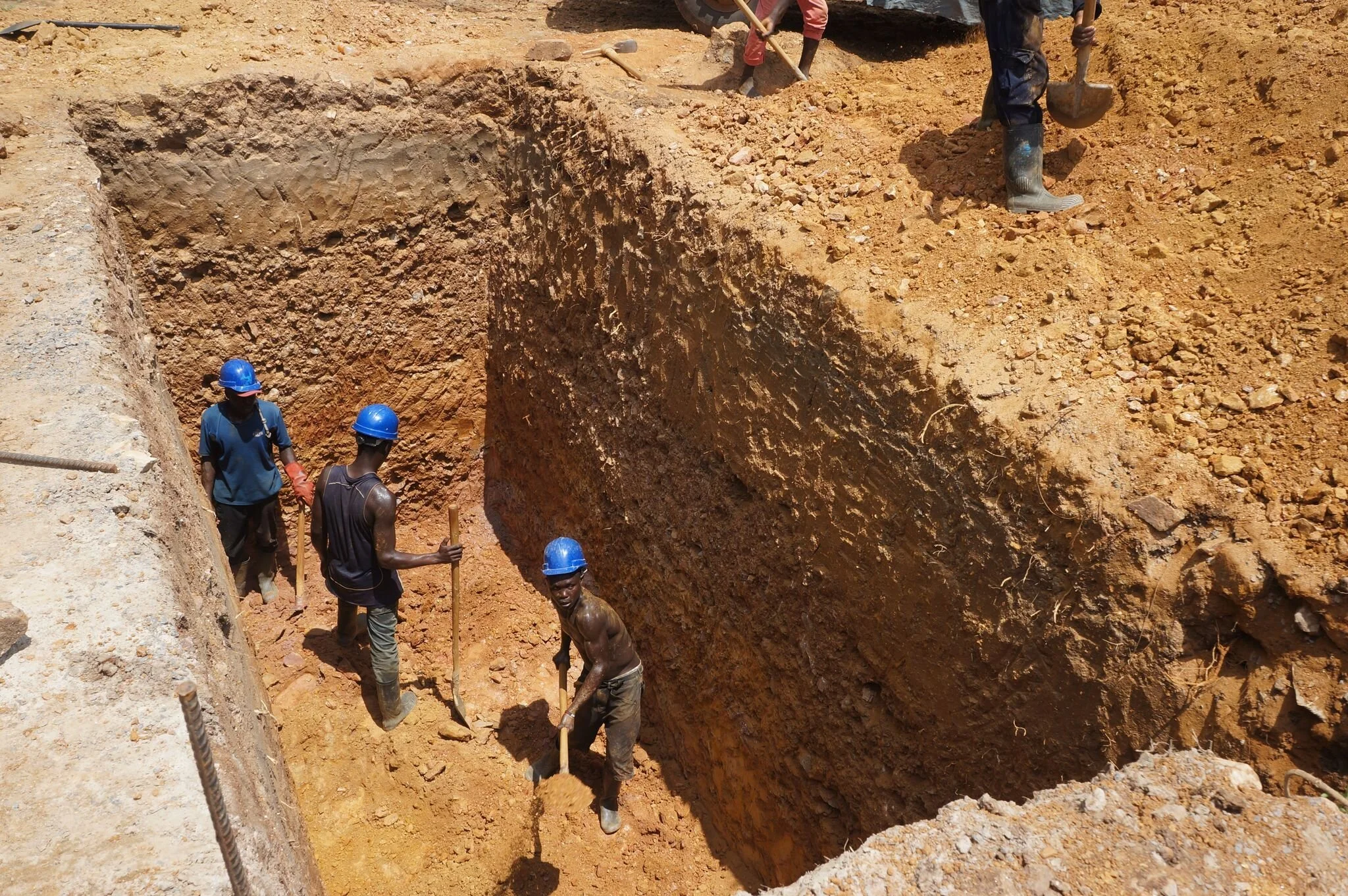 Digging ready to install toilets and showers at the school. 