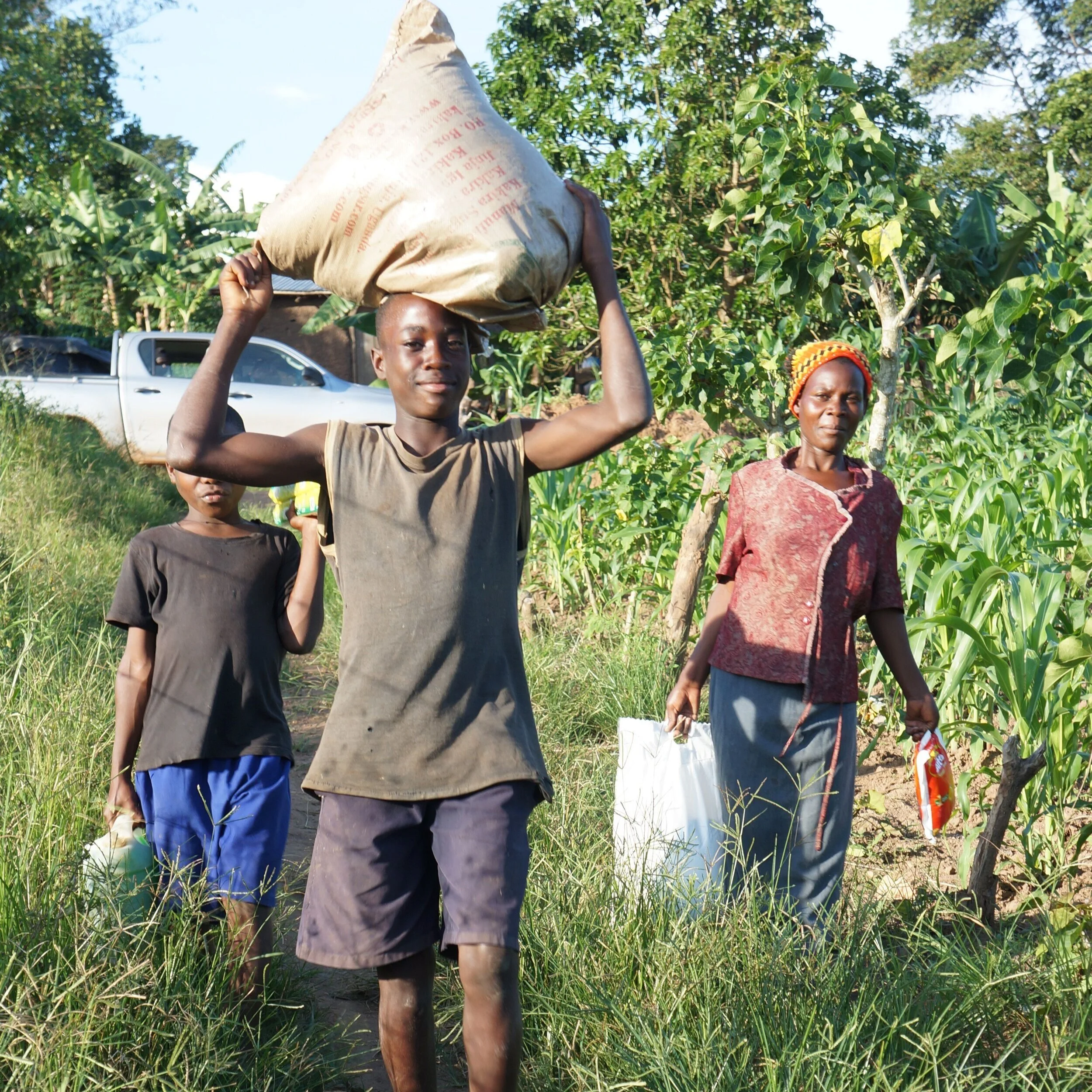 Our School for Life families taking home their essential supplies