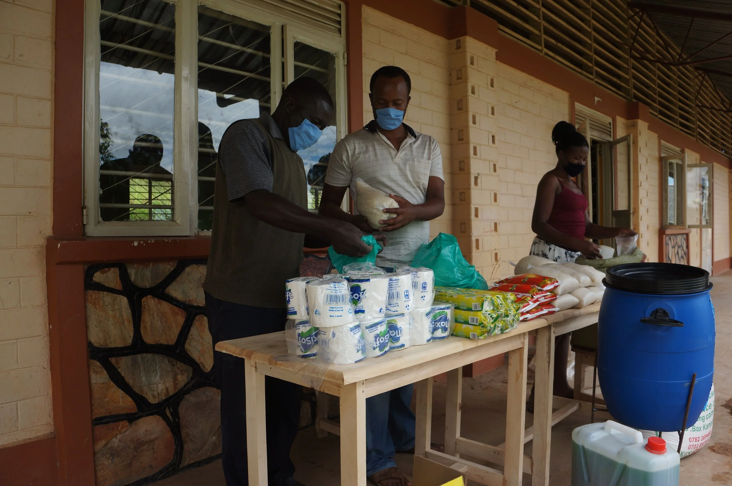 School for Life staff hard at work creating essential food and hygiene packs for students and their families