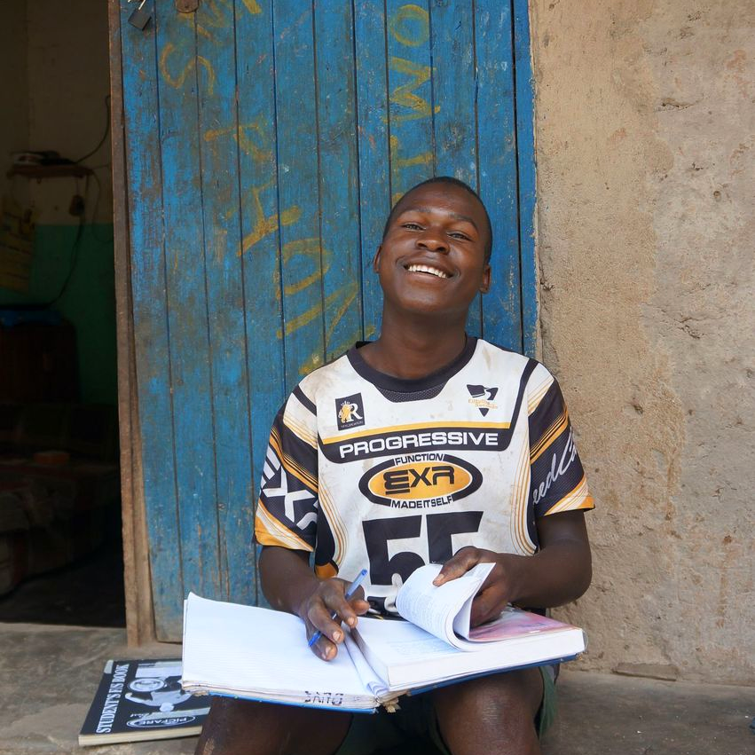 One of our School for Life students working hard at home