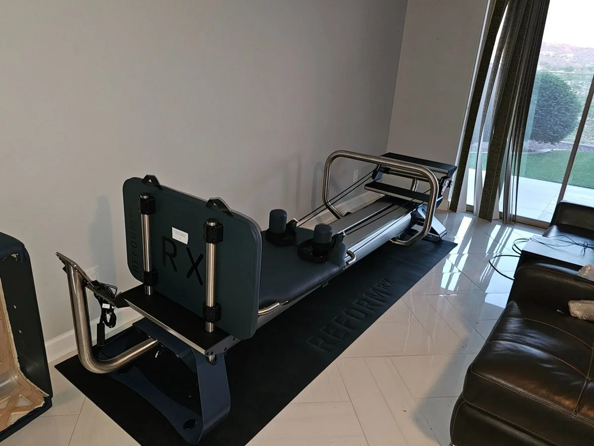 Pilates reformer assembled in a Phoenix home gym