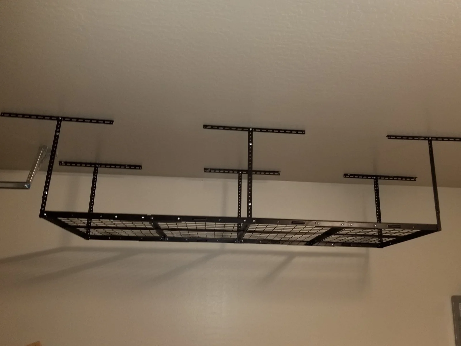 overhead garage rack and shelving installed in phoenix