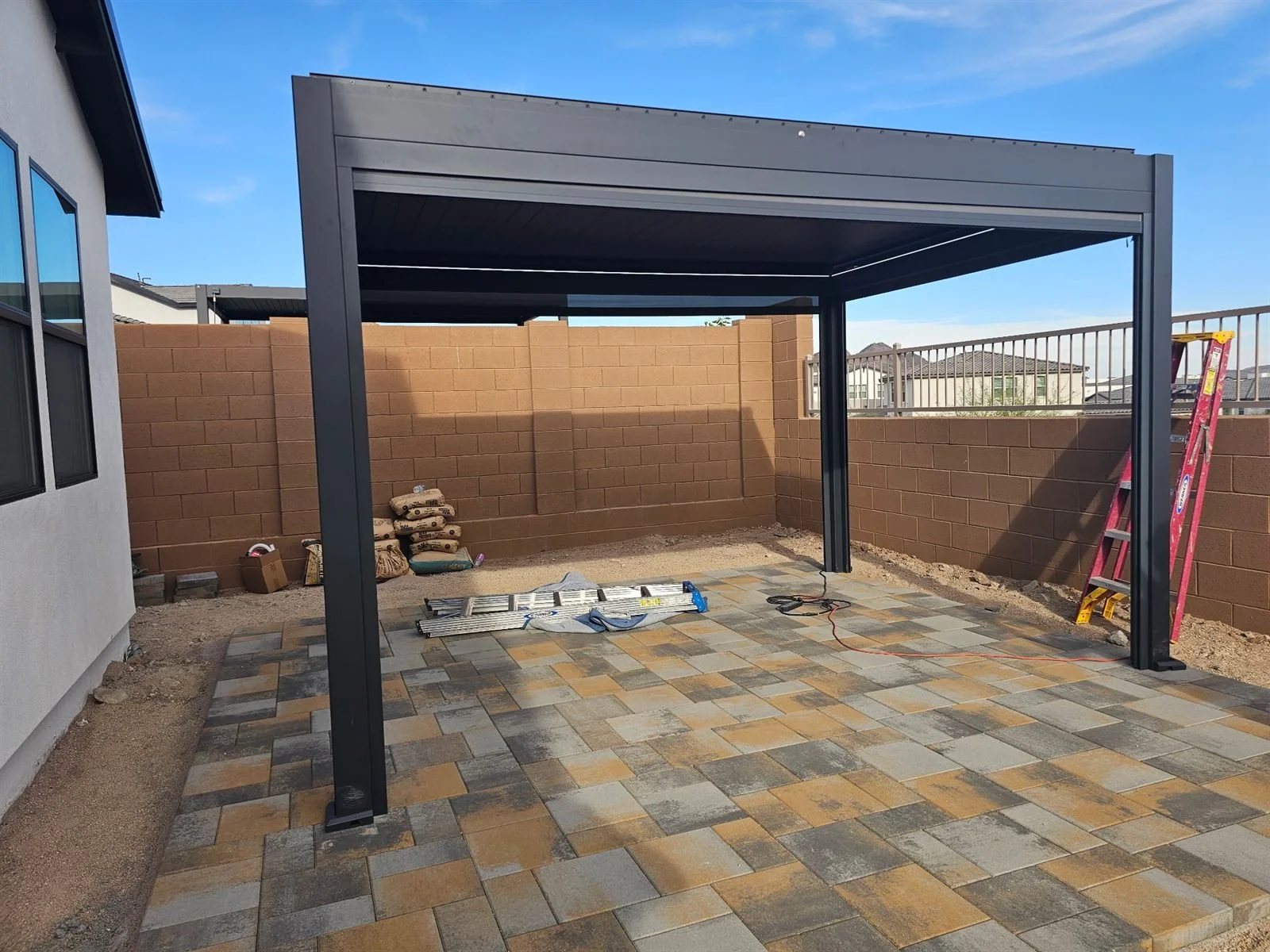Open for business (and sunshine): louvered aluminum pergola