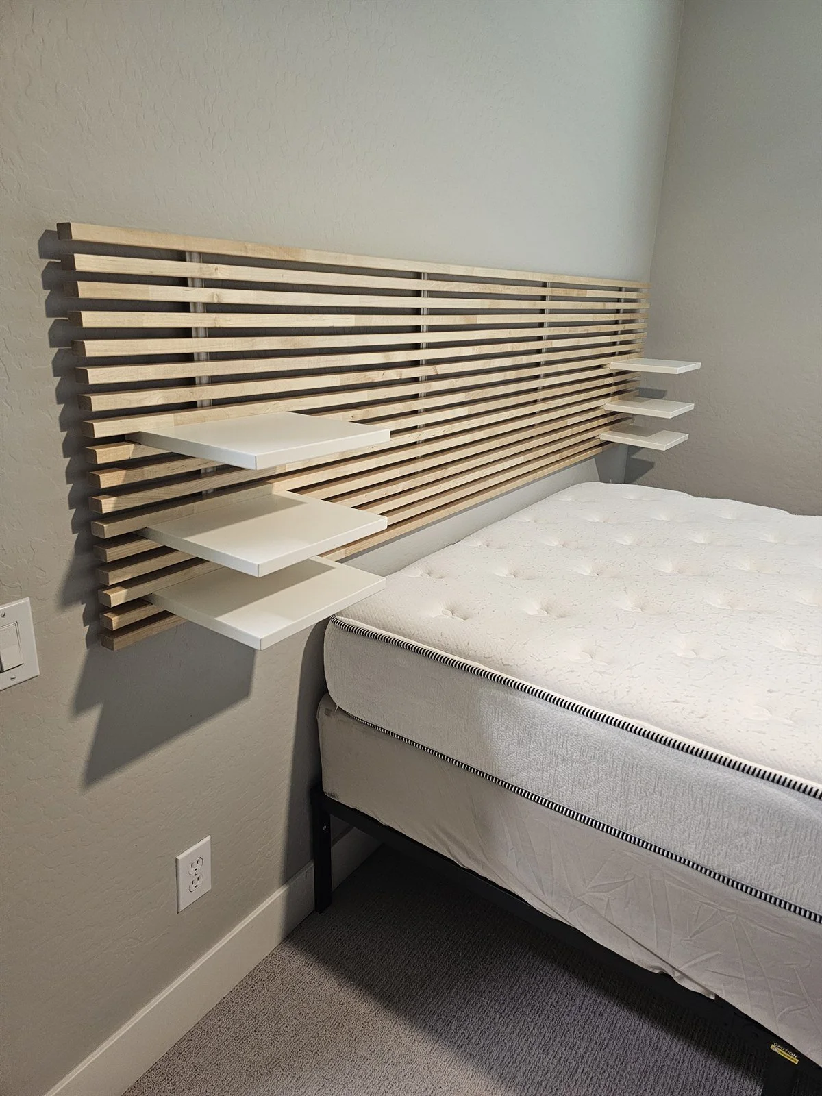 IKEA MANDAL slatted headboard with floating shelves assembled in a Gilbert bedroom