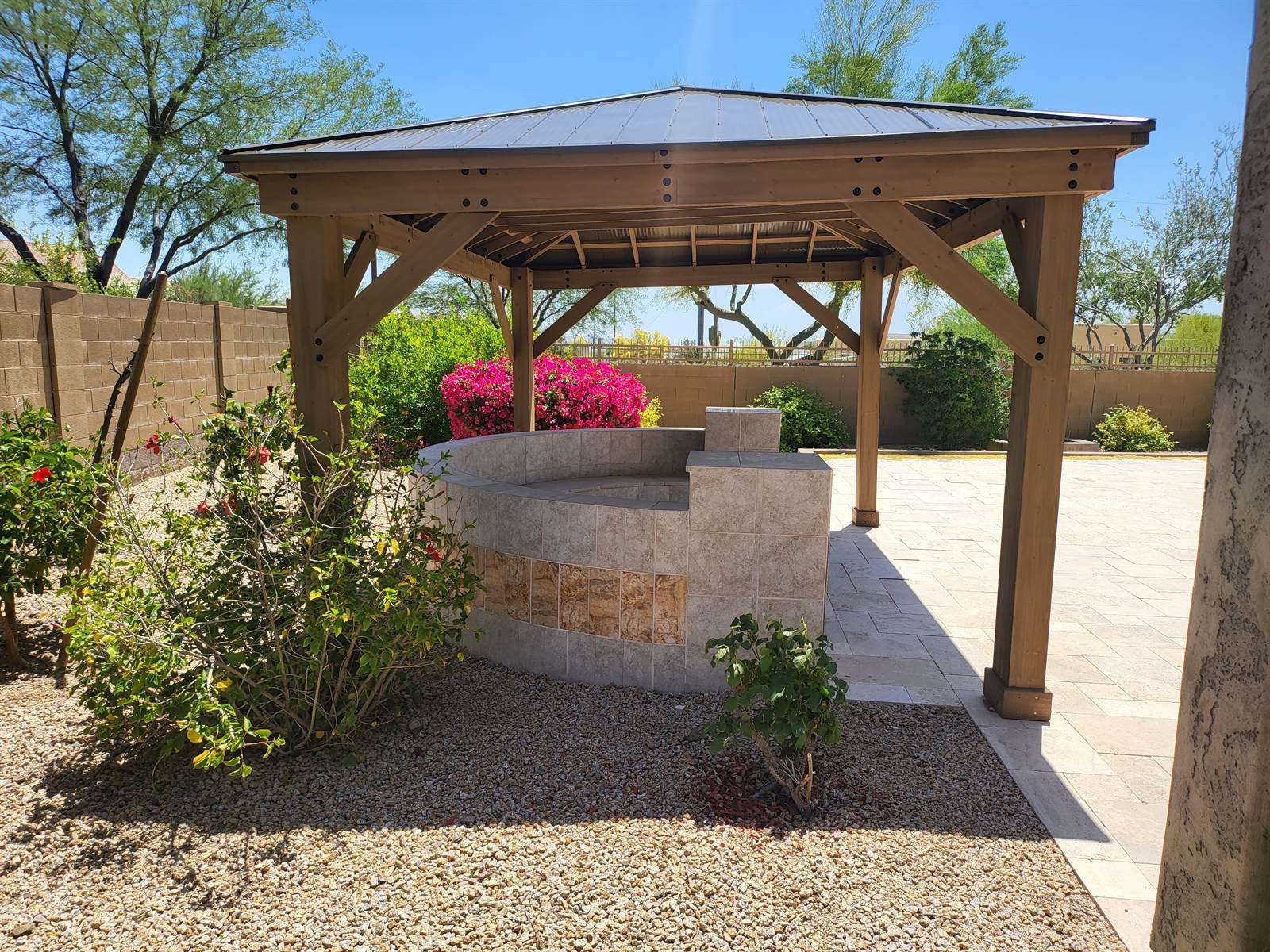 Bougainvillea approved: wood gazebo over a paver patio