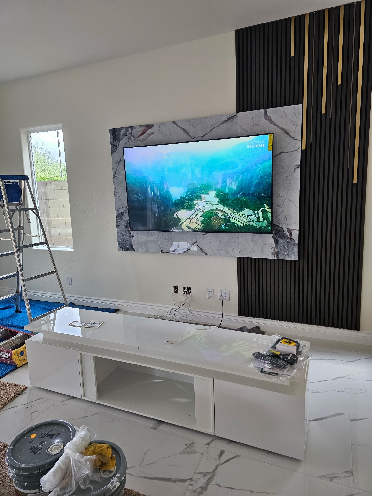 Samsung Neo OLED 75‑inch TV professionally wall‑mounted in a Happy Valley living room, delivering stunning visuals and sleek design.
