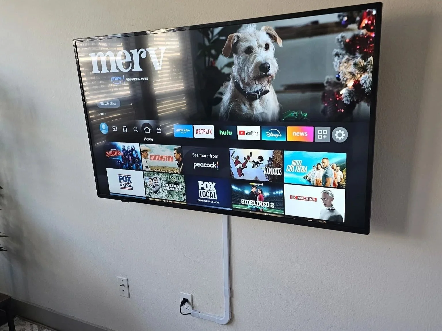 On-wall TV wire concealment with raceway strips in a Phoenix, AZ home — no drywall cutting required