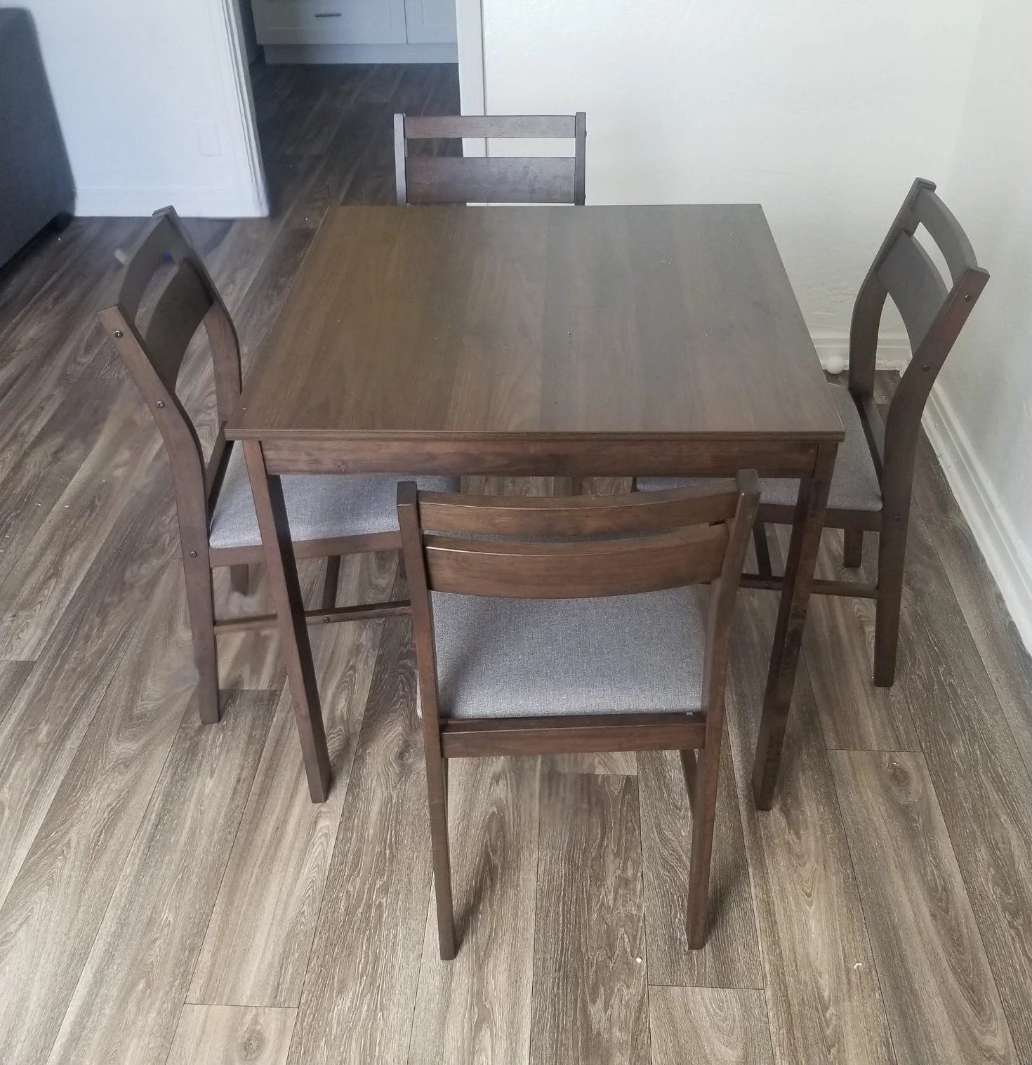 Dining table and four chairs assembled by Helping Hands