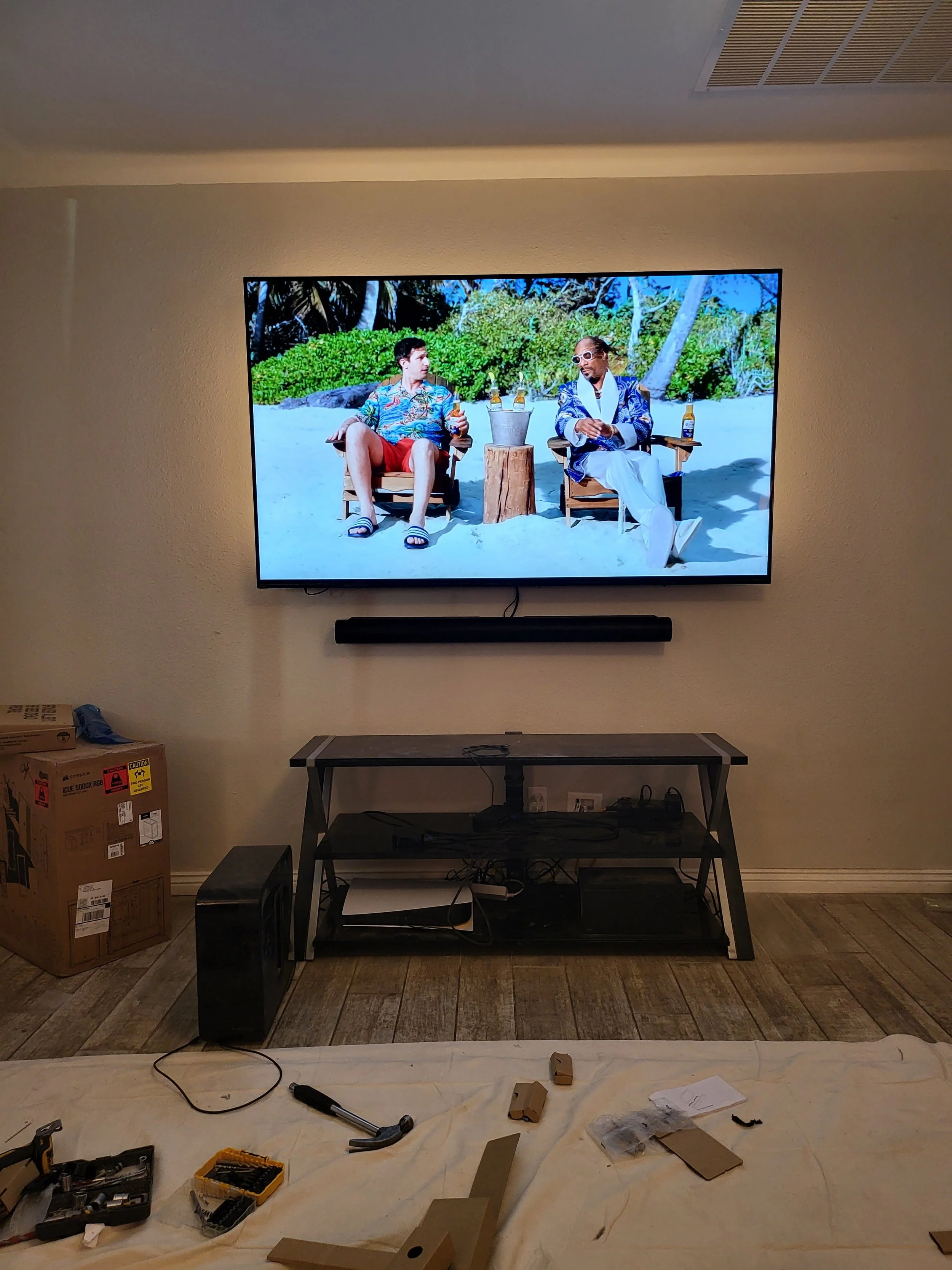 Weatherproof outdoor patio TV wall mounting in a Phoenix backyard entertainment area, engineered with heavy-duty masonry anchors and full sun-rated bracket alignment.