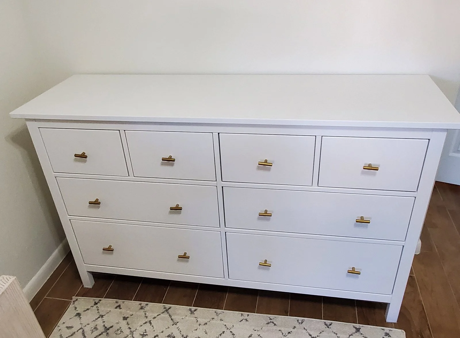 White IKEA HEMNES 8-drawer dresser assembled in a Chandler nursery