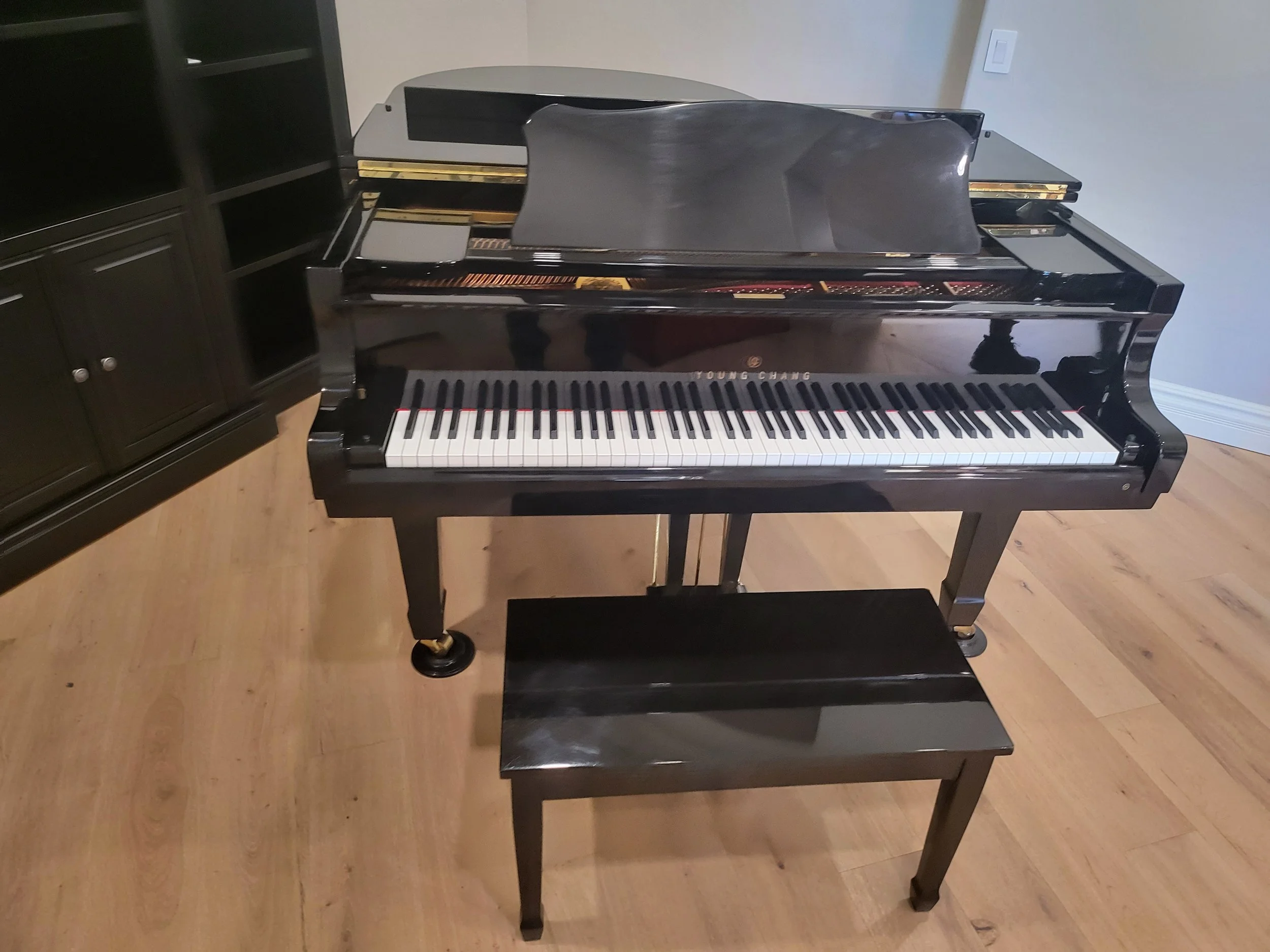 Piano moving service Phoenix AZ | Helping Hands Household Solutions