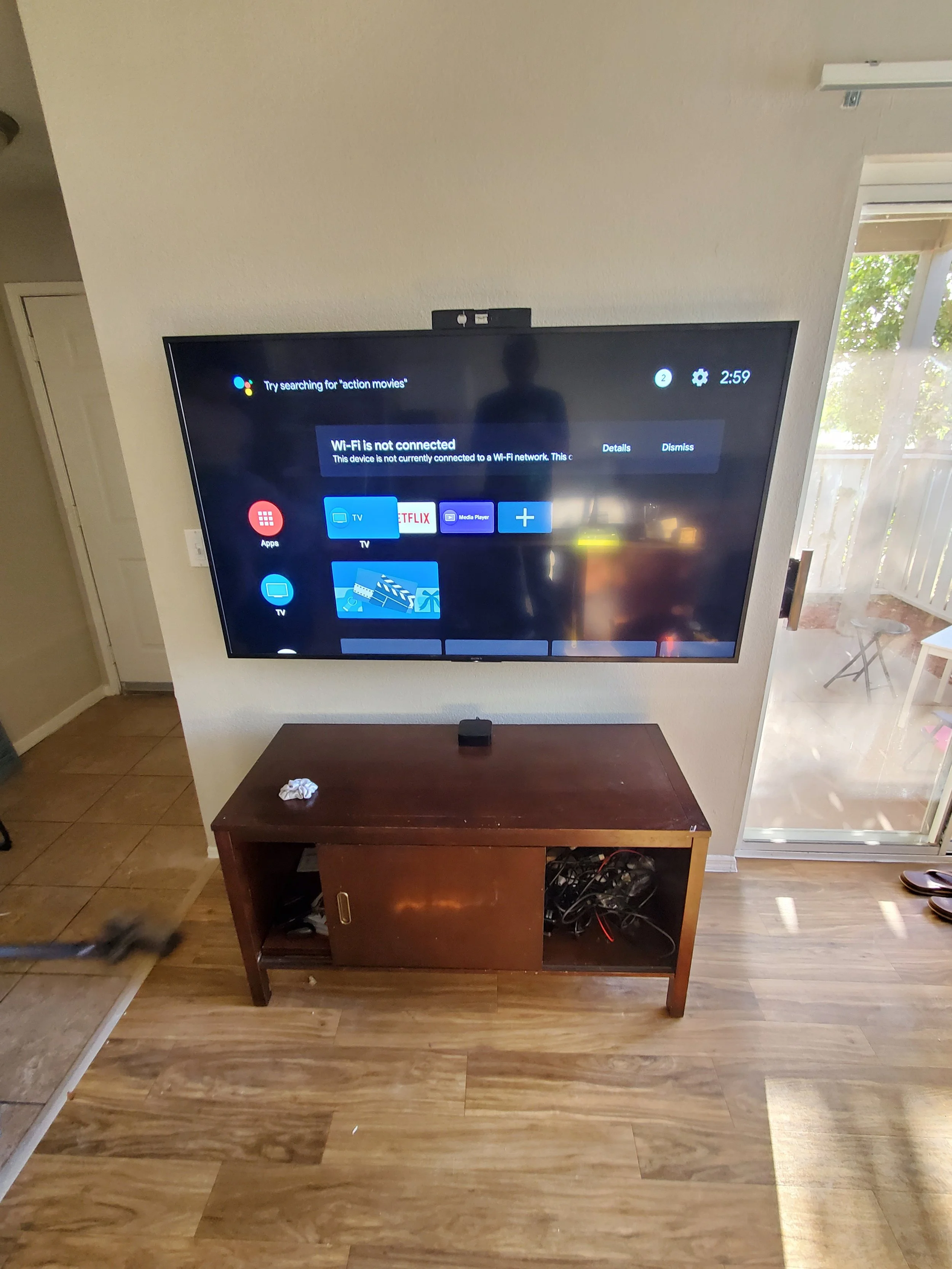Large TV mounted on drywall with wires hidden for a clean, polished look and seamless home theater integration.