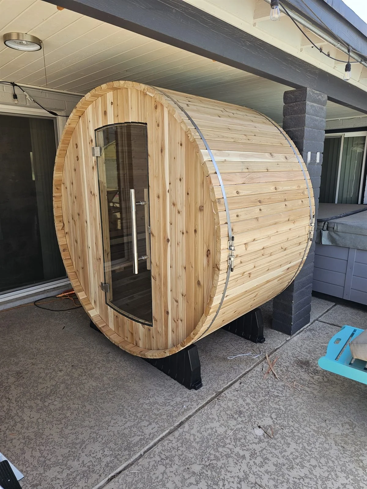 Almost Heaven outdoor barrel sauna from Costco assembled on a Phoenix patio