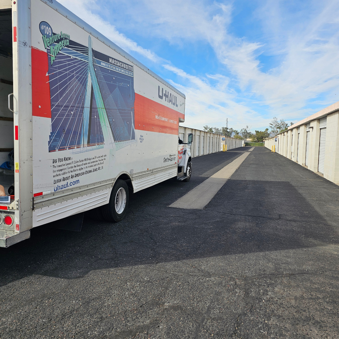 Affordable local movers loading furniture Phoenix AZ | Helping Hands