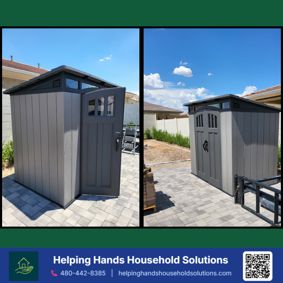 Keter resin storage shed with a slanted lean-to roof and double glass-panel doors, installed on a paver patio in a Phoenix, AZ backyard by Helping Hands Household Solutions — sleek gray vertical-panel design maximizes weatherproof storage in a small 