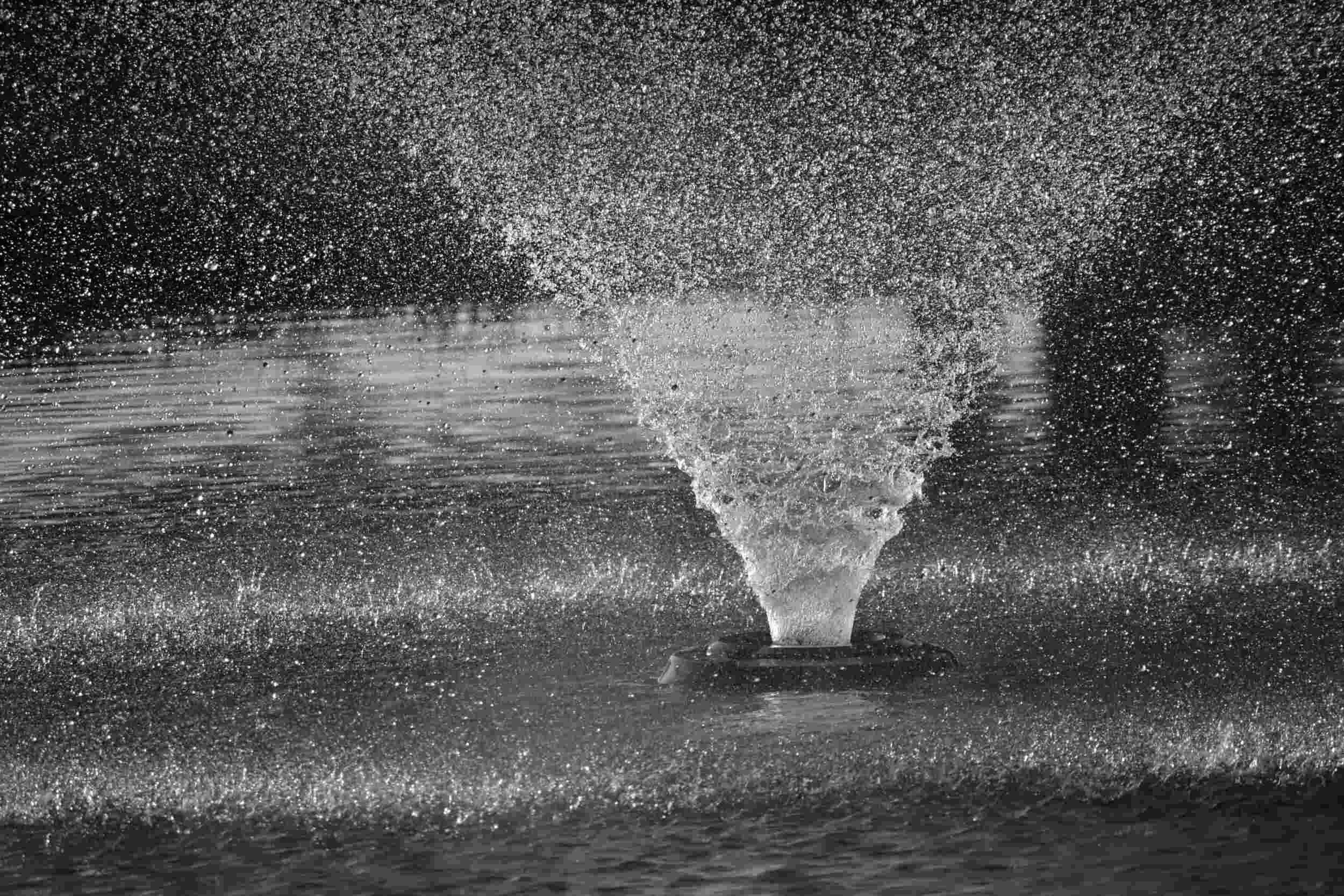 water outside spraying in the air from the ground - career coach Phoenix