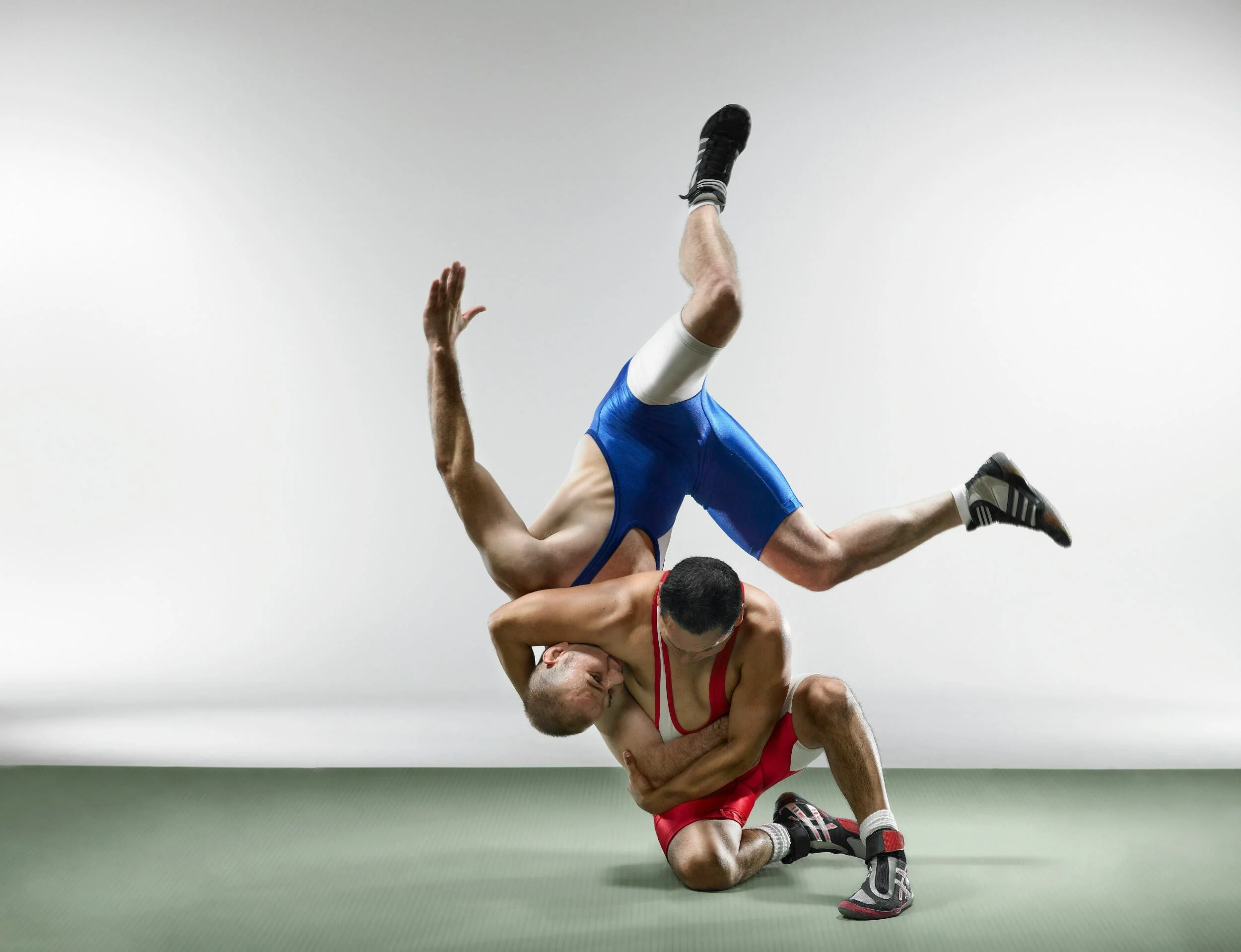 Two male wrestlers in a fight - career advice Phoenix