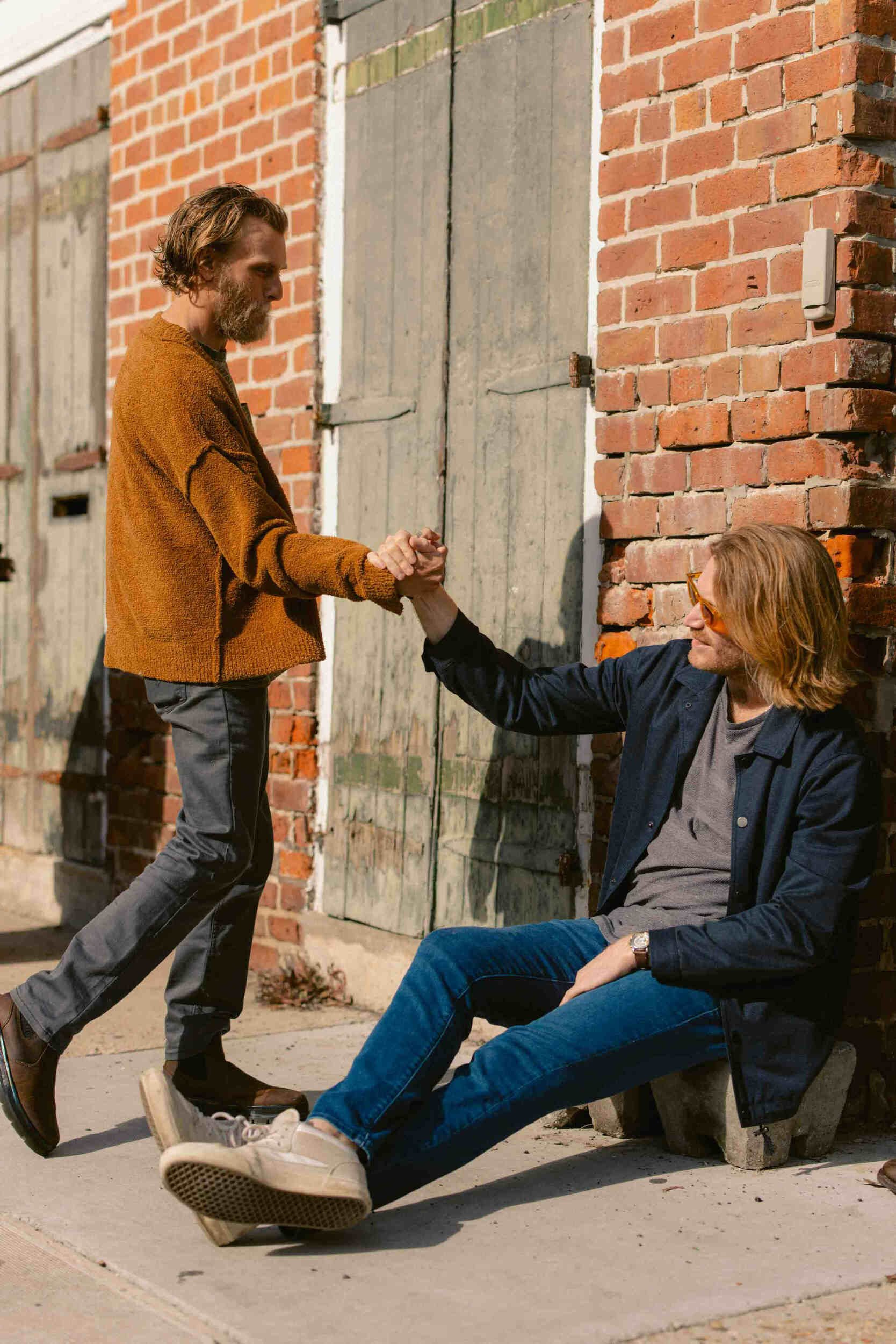 Two men outside grabbing hands - executive coach Paradise Valley