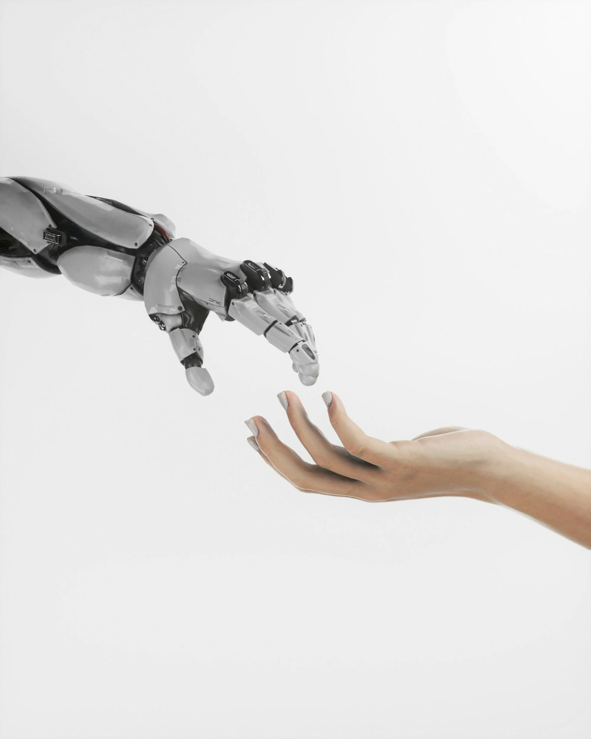 a robot hand and a human hand almost touching - career coach Phoenix