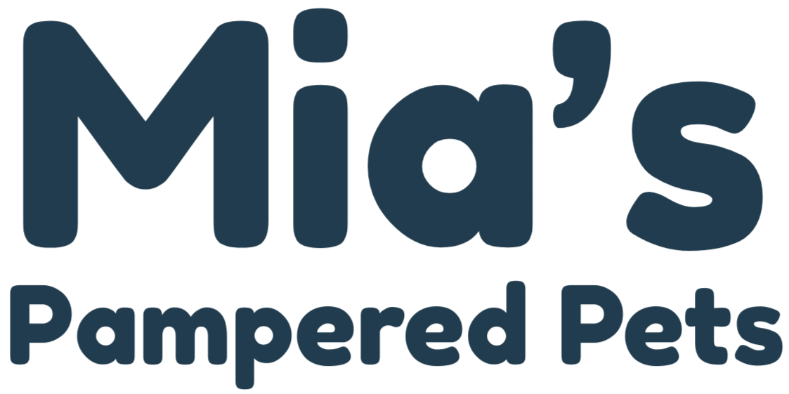 Logo with the text "Mia's Pampered Pets" in navy blue.