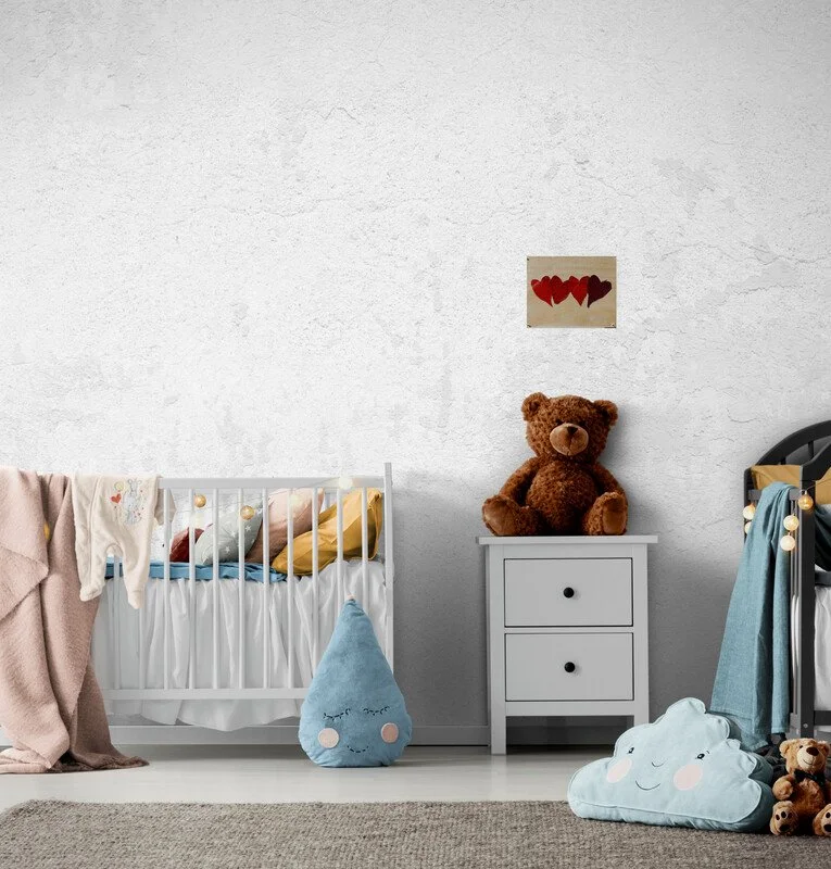 nursery-with-cots-and-soft-toys.jpg