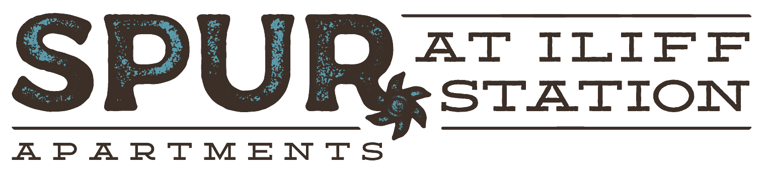 Logo for Spurr at the Fire Station Apartments with a stylized firefighter axe