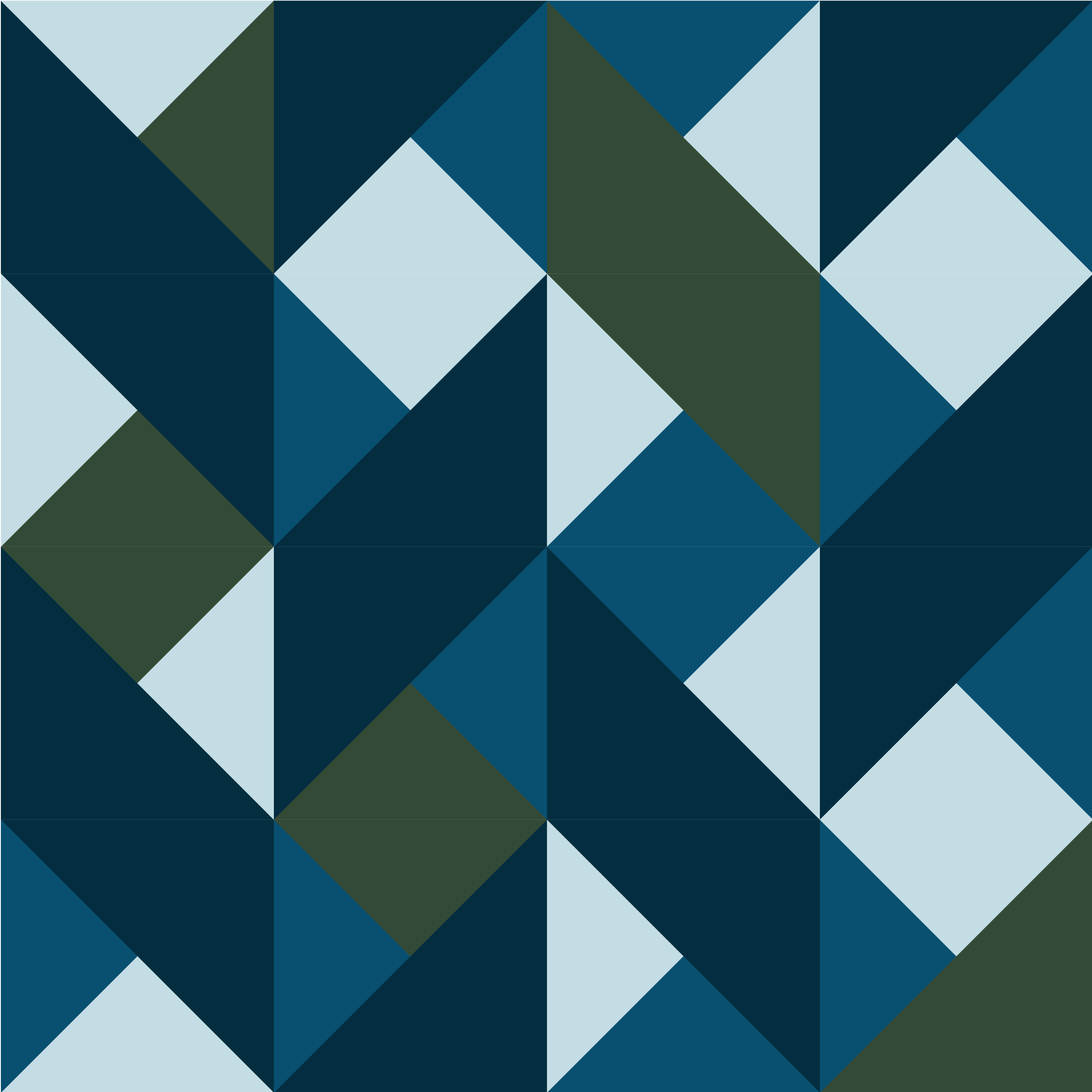 A young man with brown hair and blue eyes, wearing a dark blazer over a collared shirt, smiling against a dark blurred background.