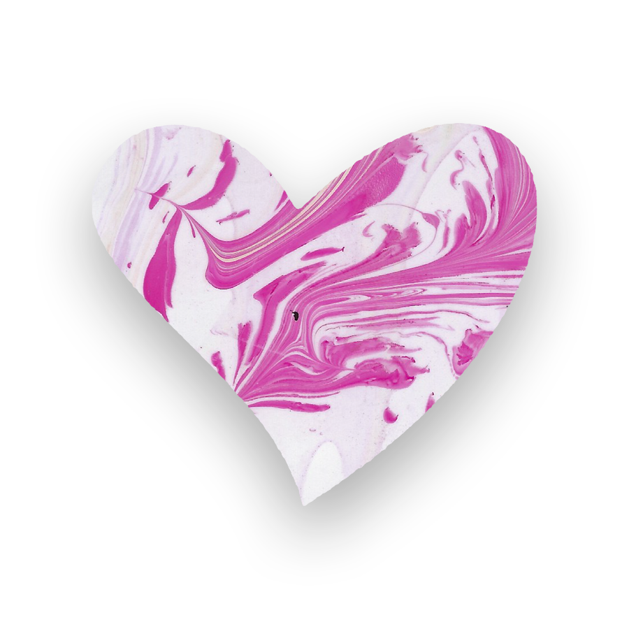 Pink and white marbled paper cut into a heart shape on a black background.