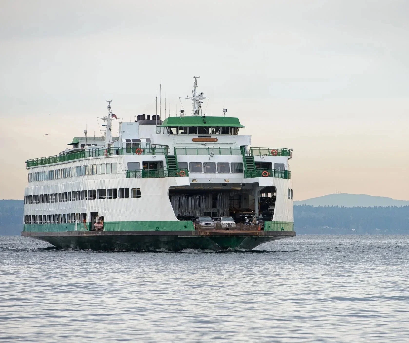 Washington State Ferry from the front on the water with a grey background